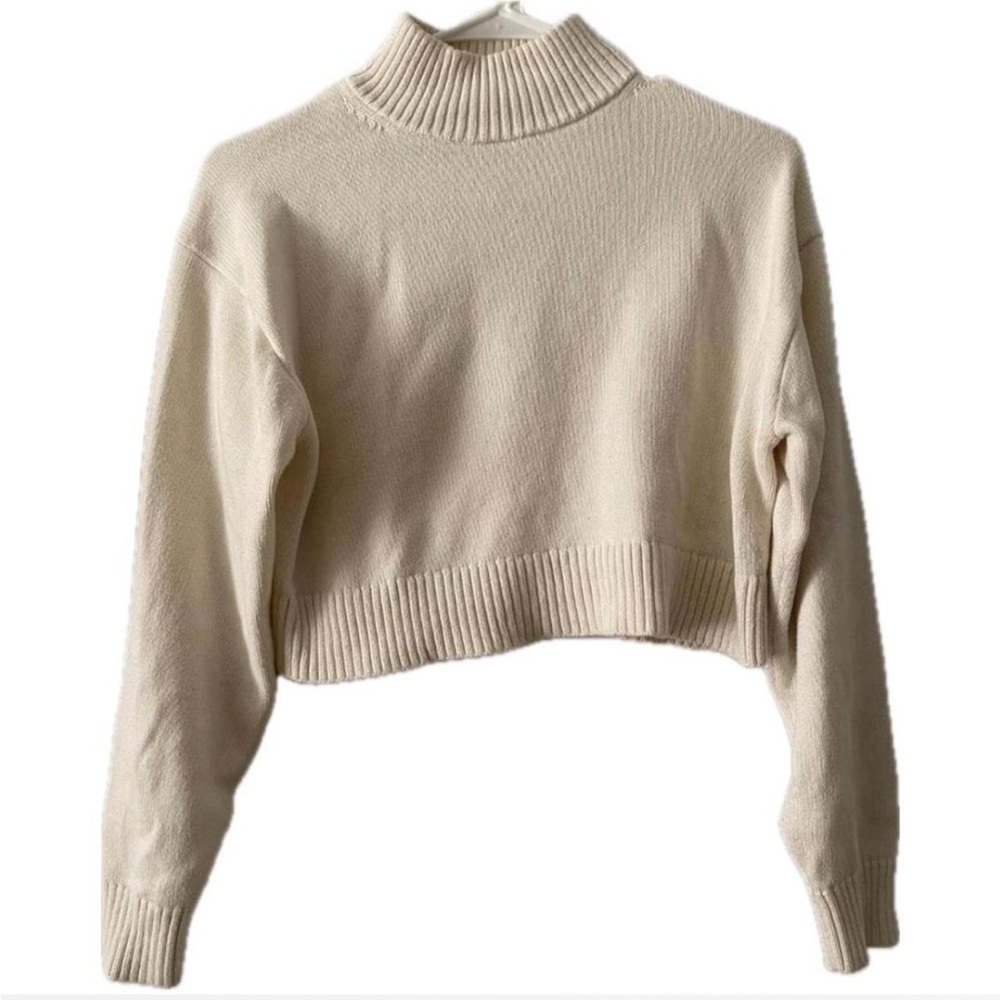 Knitted ribbed turtleneck sweater